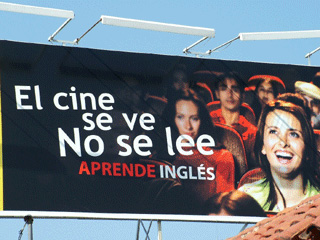 This billboard image is seen from one of the main roads in Oaxaca, Mexico.